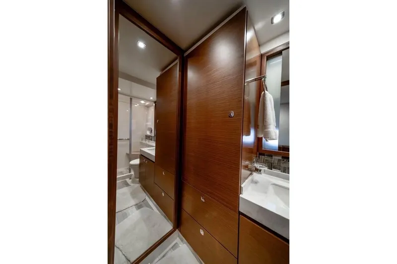 Slide: The Image of Luxurious bathroom interior of 2013 Sea Ray Sundancer 540 yacht with wooden cabinetry. - 20