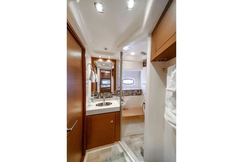 Slide: The Image of Luxurious bathroom interior of 2013 Sea Ray Sundancer 540 yacht with modern fixtures. - 21