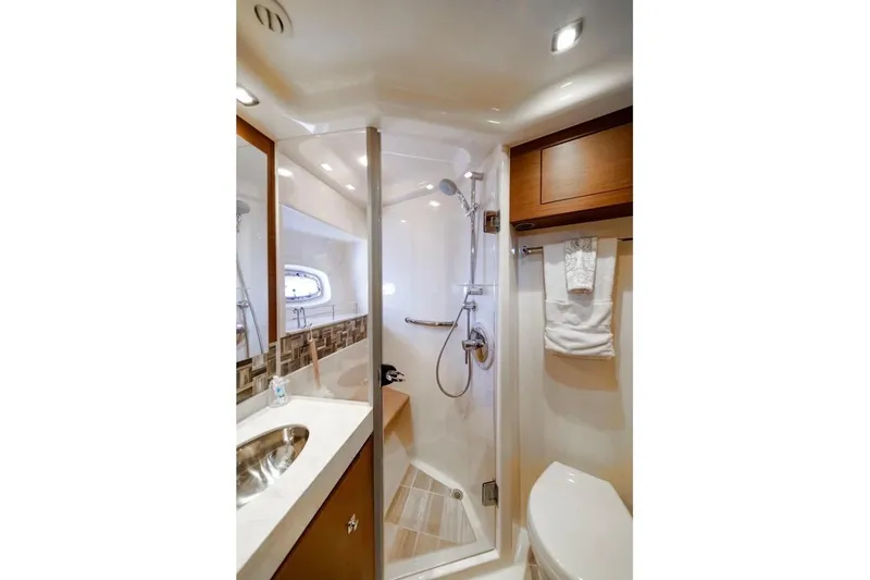 Slide: The Image of Luxurious bathroom in 2013 Sea Ray Sundancer 540 yacht, featuring modern shower and elegant fixtures. - 22