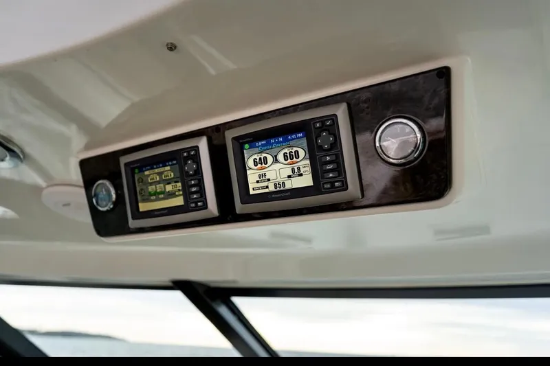 Slide: The Image of Control panel of 2013 Sea Ray Sundancer 540 yacht with digital displays. - 37