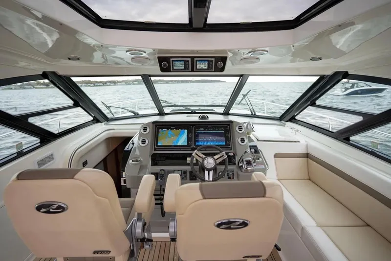 Slide: The Image of Luxurious 2013 Sea Ray Sundancer 540 yacht cockpit with advanced navigation systems. - 40
