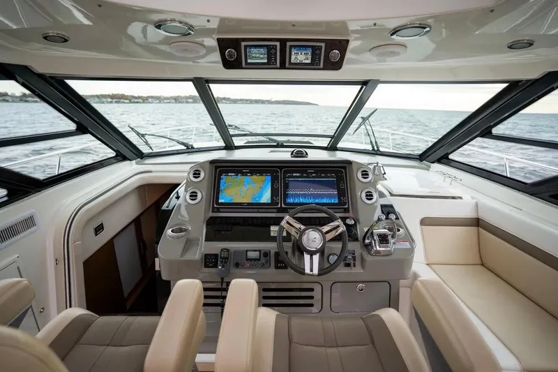 Slide: The Image of Luxurious helm of 2013 Sea Ray Sundancer 540 yacht with advanced navigation systems. - 43