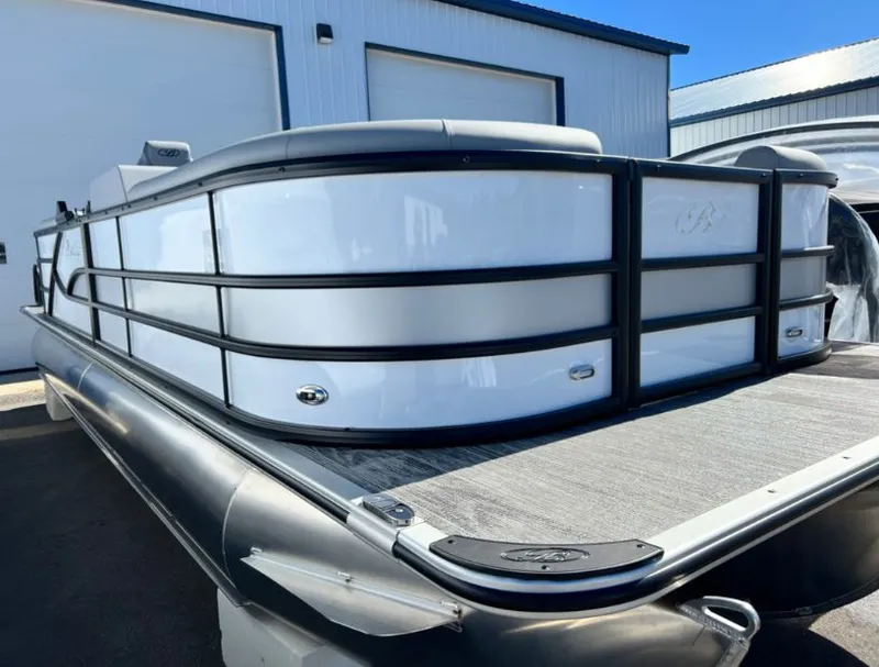 Slide: The Image of 2026 Bentley Pontoons Legacy 243 Navigator Ext at modern dock. - 13