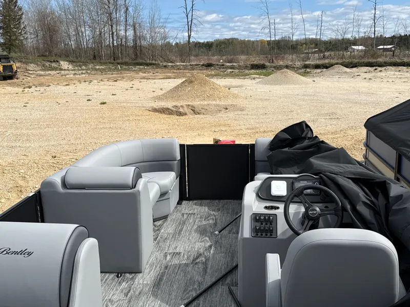 Slide: The Image of Interior of 2026 Bentley Pontoons 223 Bolt on gravel surface. - 6