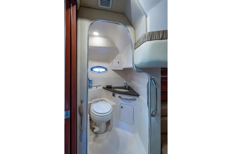 Slide: The Image of Luxurious bathroom interior of 2005 Sea Ray 420 Sundancer yacht with modern amenities. - 20