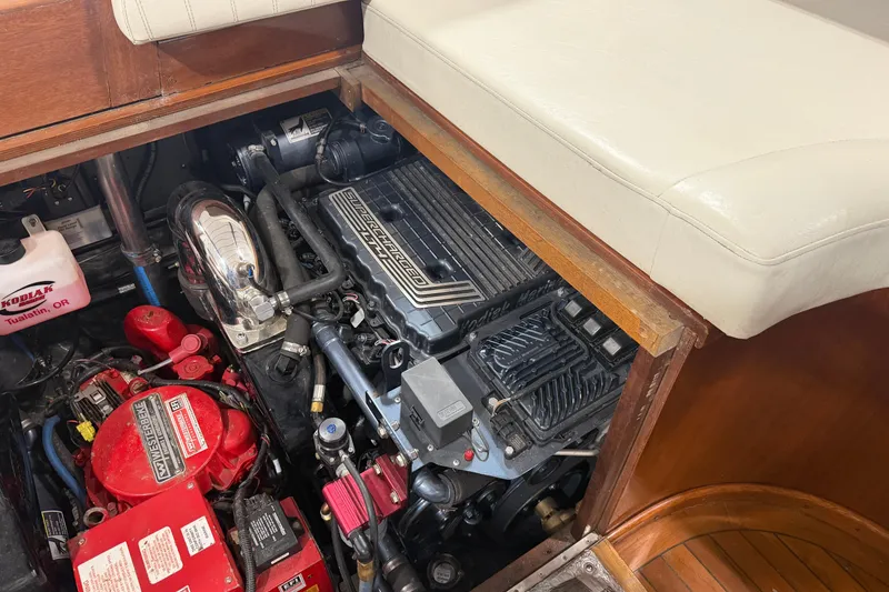 Slide: The Image of Engine compartment of a 1986 Skiff Craft X-31 Sportsman Custom boat. - 13