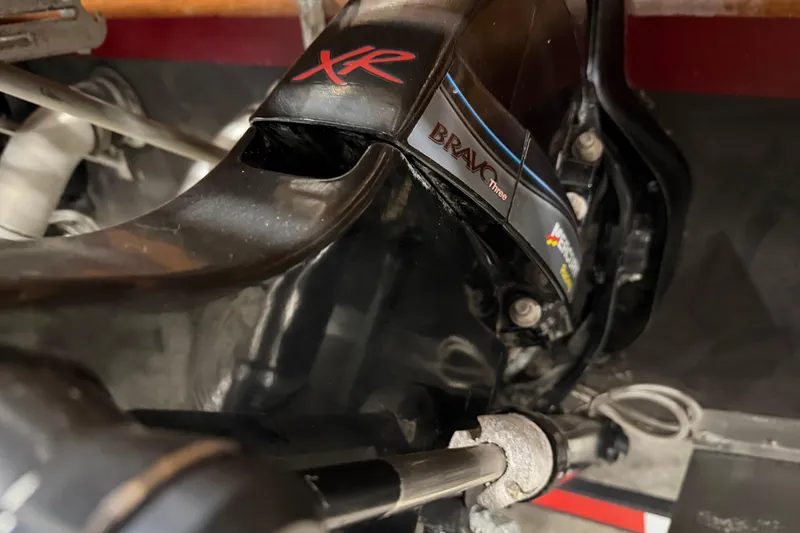 Slide: The Image of 1986 Skiff Craft X-31 Sportsman Custom engine detail with Bravo Three XR branding. - 21