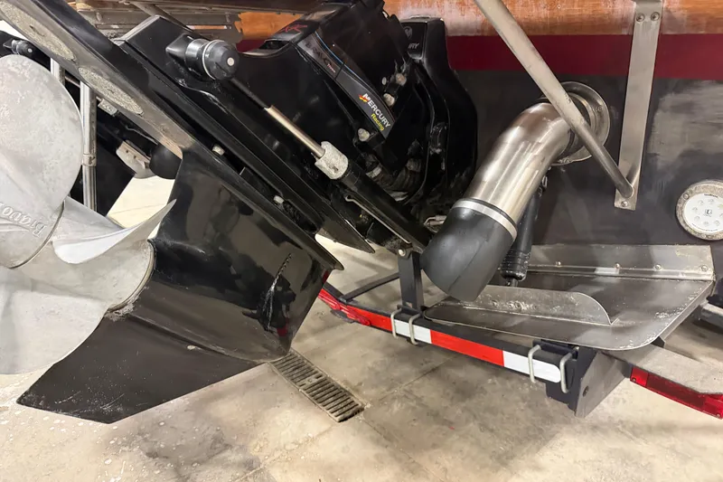 Slide: The Image of 1986 Skiff Craft X-31 Sportsman Custom boat engine and propeller detail. - 22