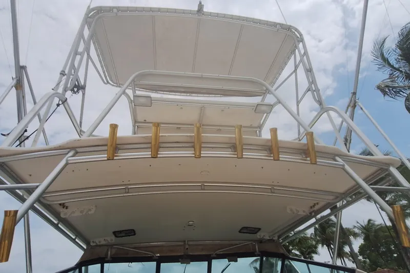 Slide: The Image of 1998 Tiara Yachts 4100 Open with sturdy upper deck. - 10