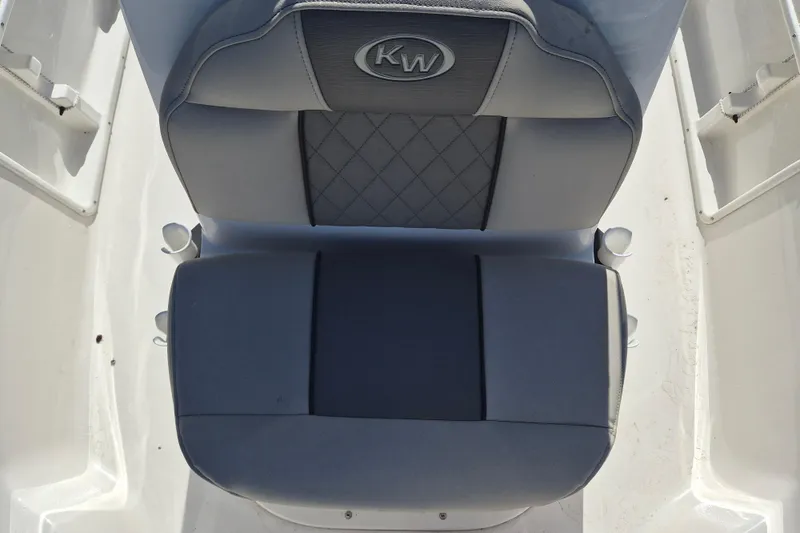 Slide: The Image of 2026 Key West 1720 Center Console boat seat with gray upholstery and KW logo. - 14