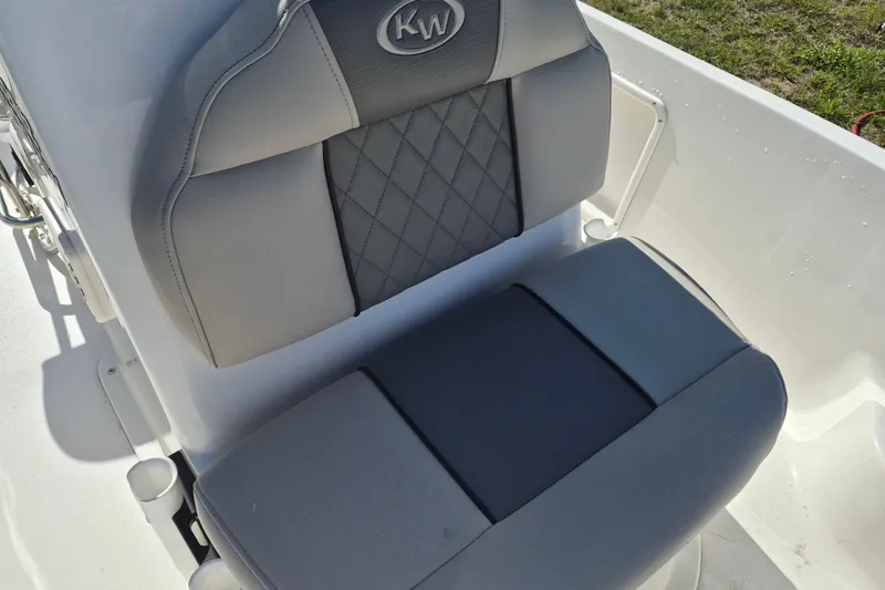 Slide: The Image of 2026 Key West 1720 Center Console boat seat with gray upholstery and diamond stitching. - 15