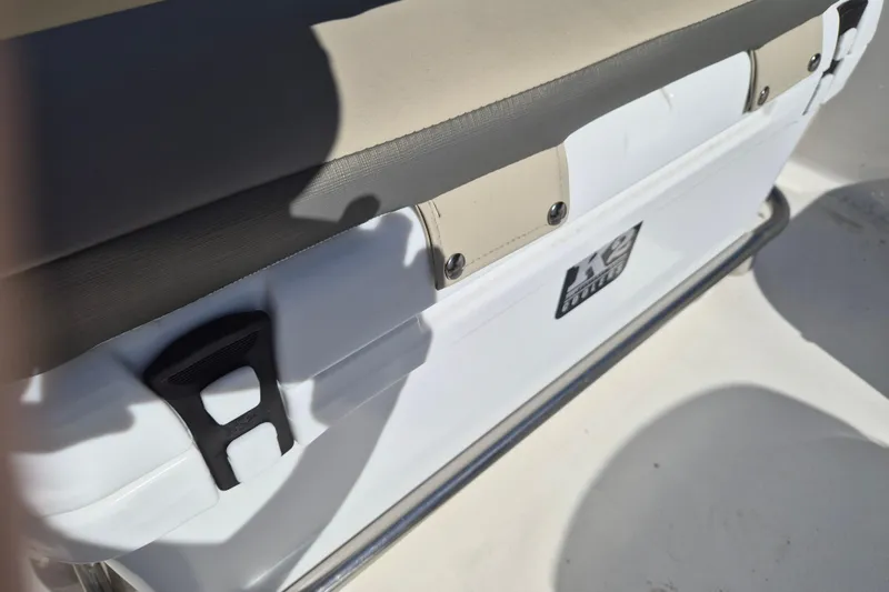 Slide: The Image of 2026 Key West 1720 Center Console boat seat with cooler and cushion. - 8