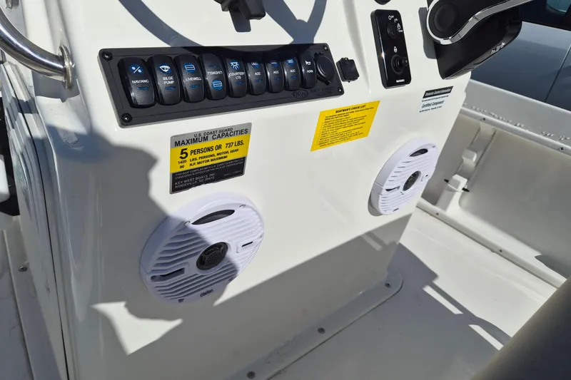 Slide: The Image of 2026 Key West 1720 Center Console dashboard with controls and capacity label. - 9