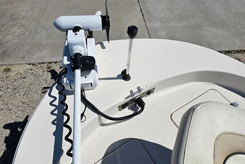 Slide: The Image of 2022 Carolina Skiff 178 JLS boat deck with trolling motor and control lever. - 13