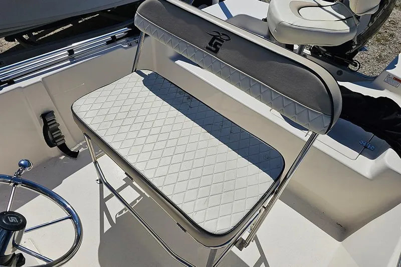 Slide: The Image of 2022 Carolina Skiff 178 JLS boat seat with diamond-pattern upholstery. - 18
