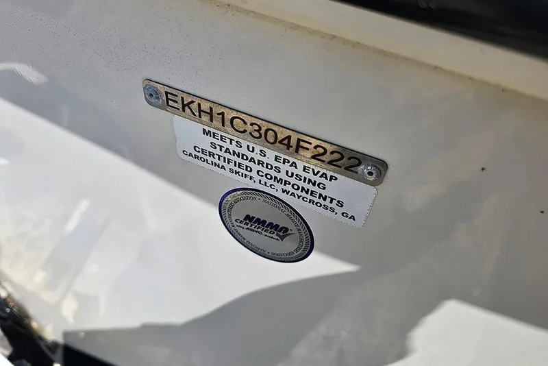 Slide: The Image of 2022 Carolina Skiff 178 JLS compliance plate with EPA standards certification. - 23