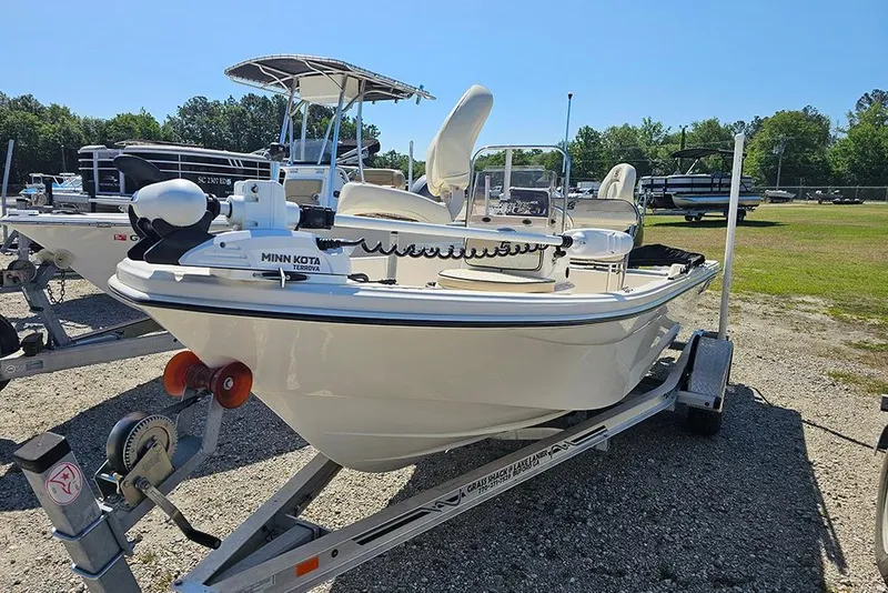 Slide: The Image of 2022 Carolina Skiff 178 JLS boat on trailer, equipped with Minn Kota trolling motor. - 6