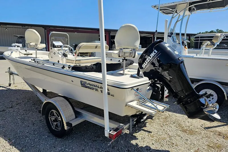 Slide: The Image of 2022 Carolina Skiff 178 JLS boat with Suzuki outboard motor on trailer. - 8