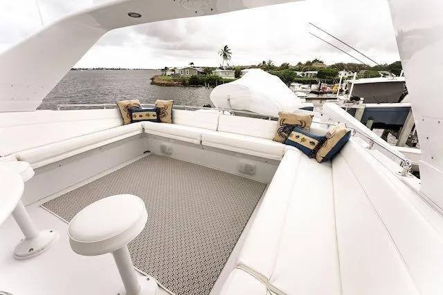 Slide: The Image of Spacious kitchen in 1999 Hatteras 74 Sport Deck Motor Yacht with modern appliances and wood flooring. - 20