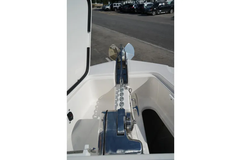 Slide: The Image of 2024 Edgewater 285CC boat anchor system with chain and cleat. - 35