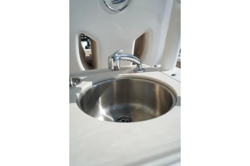 Slide: The Image of Stainless steel sink and faucet on 2024 Edgewater 285CC boat. - 6