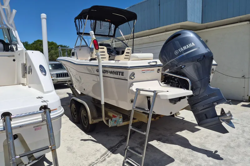 Slide: The Image of 2022 Grady-White Adventure 208 boat with Yamaha outboard motor on trailer. - 13