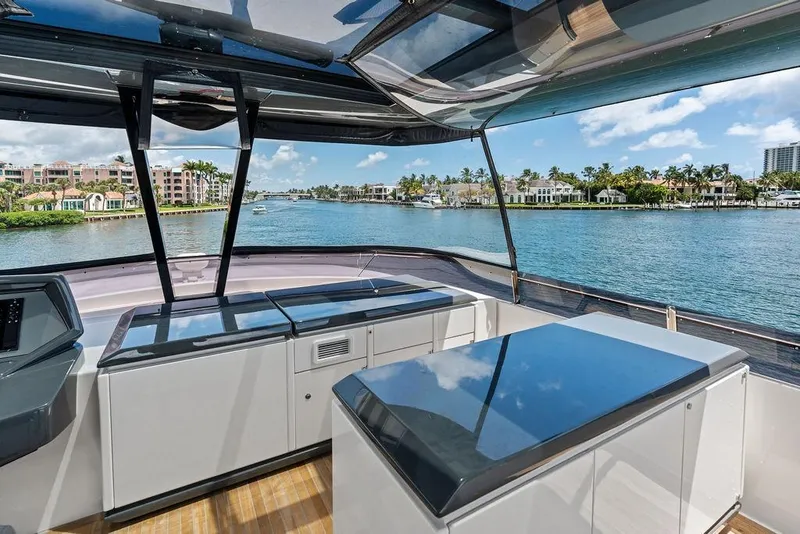 Slide: The Image of Luxurious 2018 Ferretti Yachts 850 Motoryacht interior with scenic waterfront view. - 20