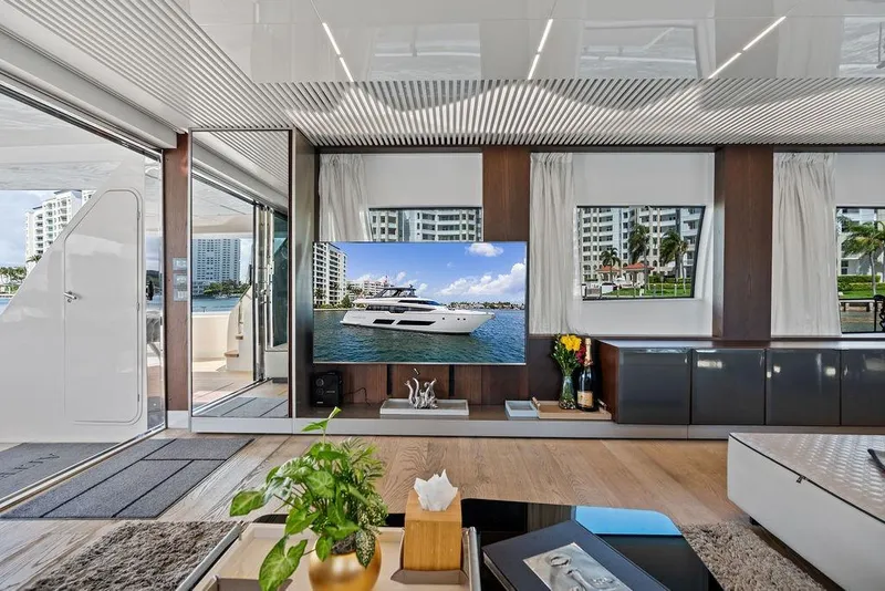 Slide: The Image of Luxurious interior of a 2018 Ferretti Yachts 850 Motoryacht with modern decor and large windows. - 38