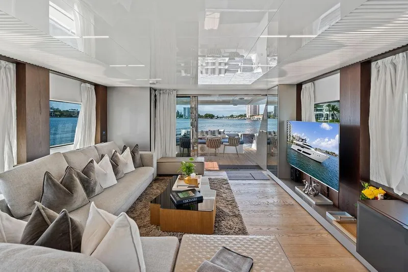 Slide: The Image of Luxurious interior of 2018 Ferretti Yachts 850 Motoryacht with elegant seating and waterfront view. - 43