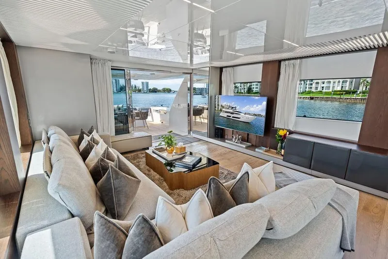 Slide: The Image of Luxurious interior of 2018 Ferretti Yachts 850 Motoryacht with elegant seating and waterfront views. - 44