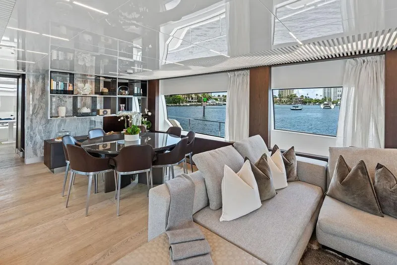 Slide: The Image of Luxurious interior of 2018 Ferretti Yachts 850 Motoryacht with elegant dining area and waterfront view. - 48