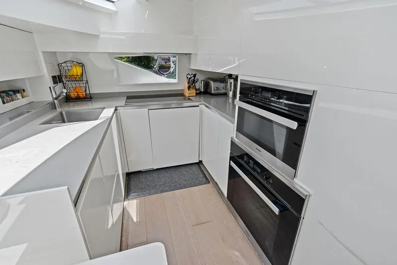 Slide: The Image of Modern kitchen interior of 2018 Ferretti Yachts 850 Motoryacht with sleek appliances. - 53