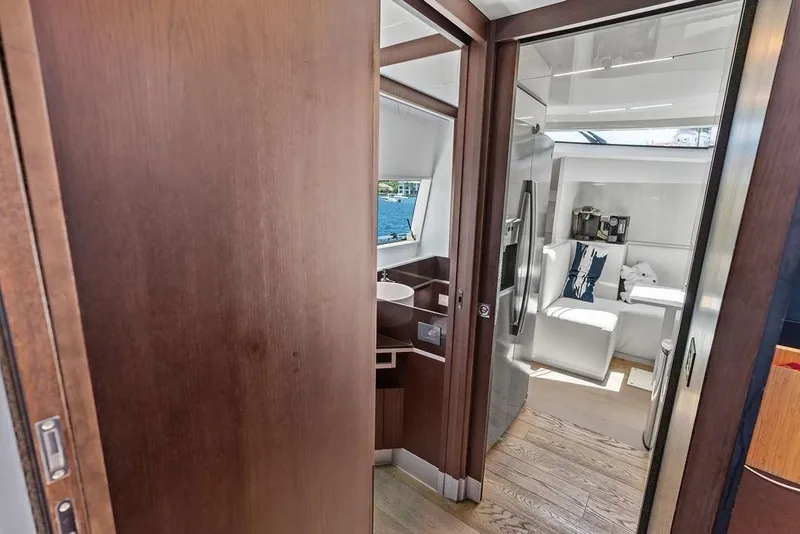 Slide: The Image of Interior view of 2018 Ferretti Yachts 850 Motoryacht, featuring modern design and wooden finishes. - 55
