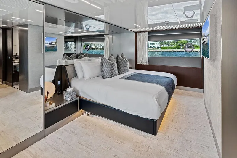 Slide: The Image of Luxurious bedroom interior of 2018 Ferretti Yachts 850 Motoryacht with modern design and waterfront view. - 58