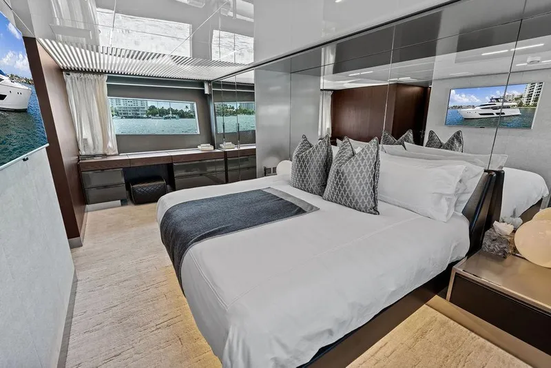 Slide: The Image of Luxurious bedroom interior of 2018 Ferretti Yachts 850 Motoryacht with elegant decor and waterfront view. - 59