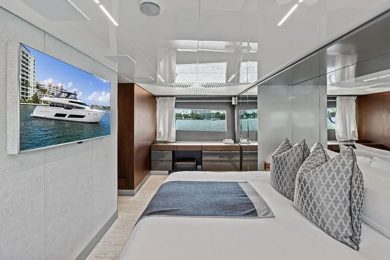 Slide: The Image of Luxurious interior of 2018 Ferretti Yachts 850 Motoryacht with elegant bedroom and scenic window view. - 60