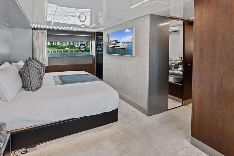Slide: The Image of Luxurious bedroom interior of 2018 Ferretti Yachts 850 Motoryacht with modern decor and waterfront view. - 62