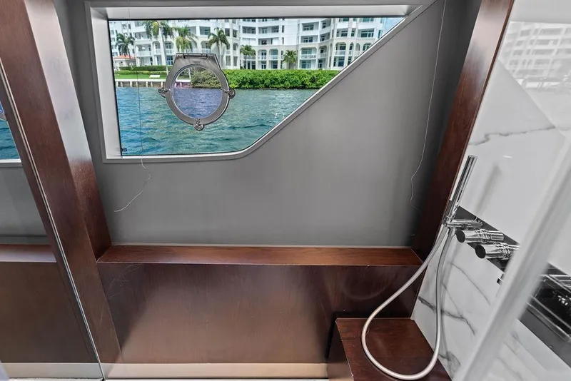 Slide: The Image of Luxurious bathroom interior of 2018 Ferretti Yachts 850 Motoryacht with scenic window view. - 64