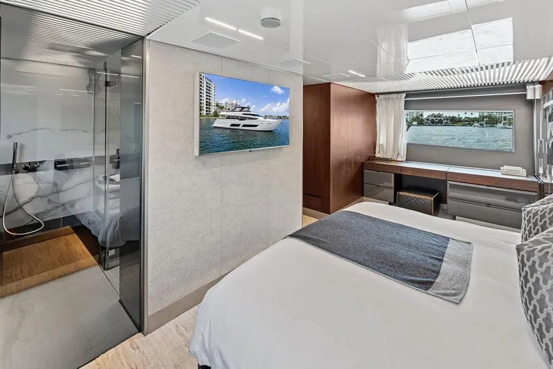 Slide: The Image of Luxurious bedroom interior of 2018 Ferretti Yachts 850 Motoryacht with modern design and scenic window view. - 66