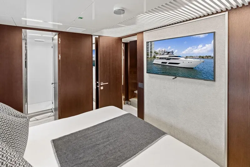 Slide: The Image of Luxurious bedroom interior of 2018 Ferretti Yachts 850 Motoryacht with TV display. - 68