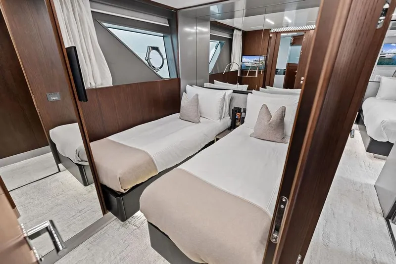 Slide: The Image of Luxurious twin bedroom on 2018 Ferretti Yachts 850 Motoryacht, featuring elegant wood finishes. - 70