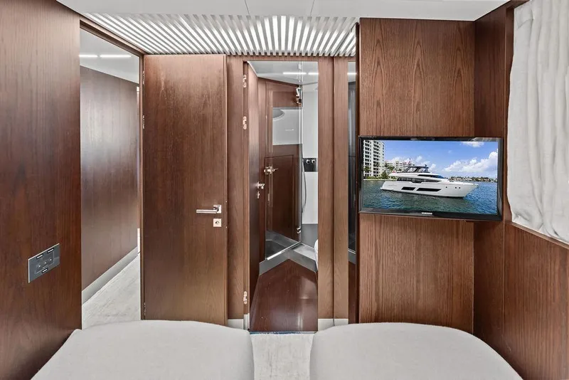 Slide: The Image of Luxurious interior of 2018 Ferretti Yachts 850 Motoryacht with wood paneling and TV display. - 71