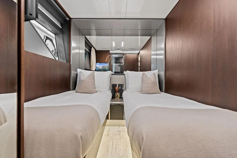 Slide: The Image of Luxurious twin cabin interior of 2018 Ferretti Yachts 850 Motoryacht with elegant wood paneling. - 73