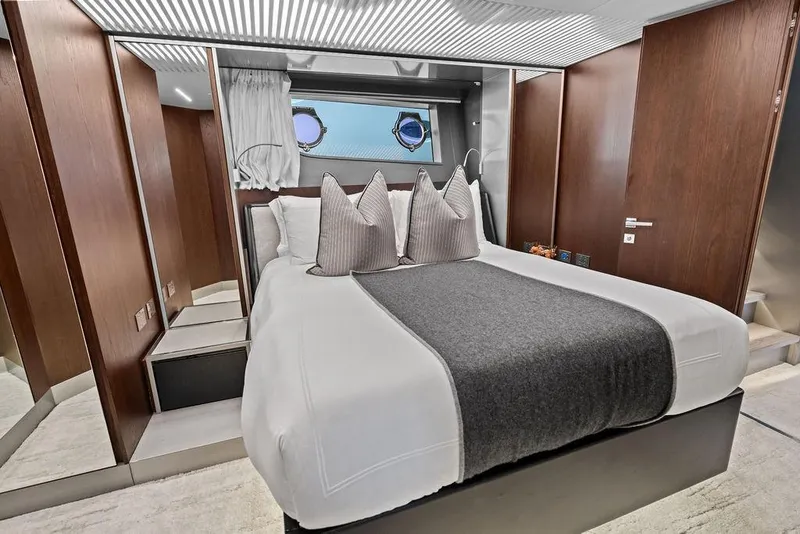 Slide: The Image of Luxurious bedroom interior of 2018 Ferretti Yachts 850 Motoryacht with elegant wood paneling. - 75