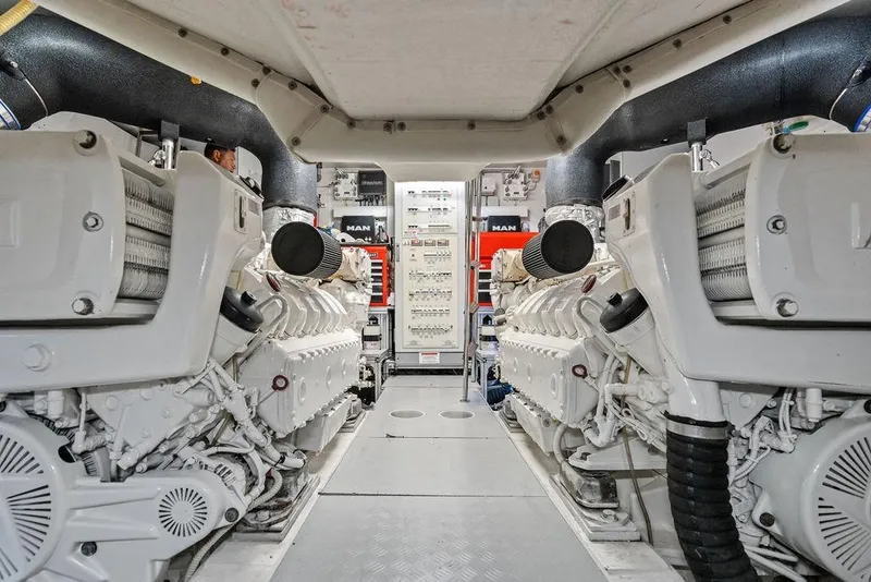 Slide: The Image of Engine room of 2018 Ferretti Yachts 850 Motoryacht, featuring dual MAN engines. - 80