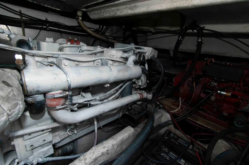 Slide: The Image of Engine room of a 1998 Maxum 4100 SCR boat, showcasing mechanical components. - 22