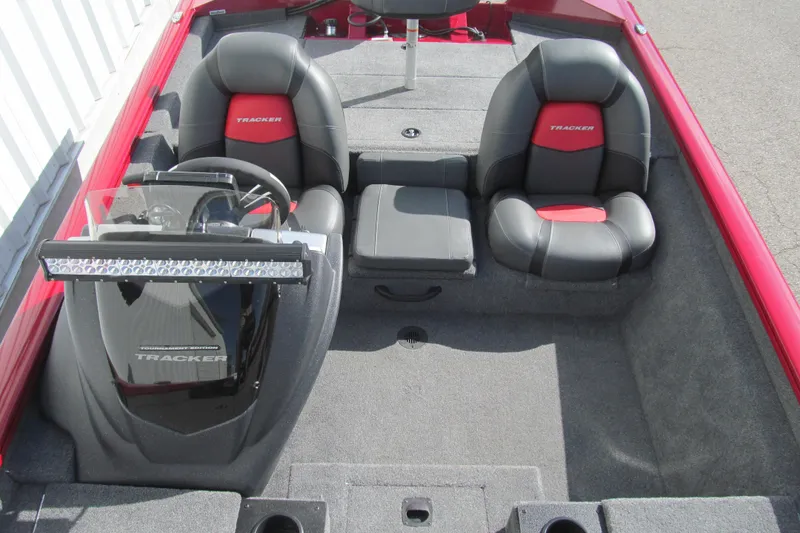 Slide: The Image of 2025 Tracker Pro Team 175 boat interior with dual seats and steering console. - 11