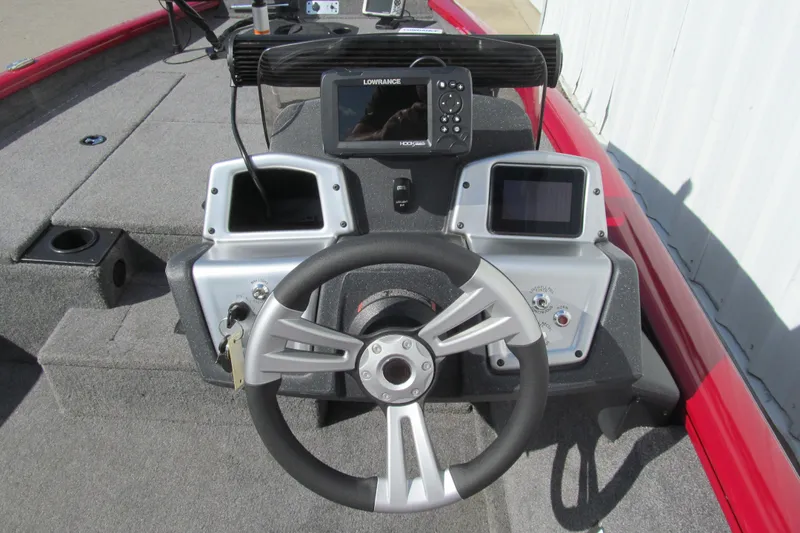 Slide: The Image of Steering console of 2025 Tracker Pro Team 175 boat with navigation system. - 6