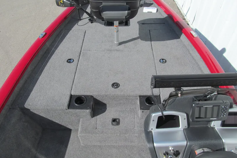 Slide: The Image of 2025 Tracker Pro Team 175 boat deck with fishing seat and control panel. - 7