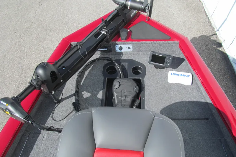 Slide: The Image of 2025 Tracker Pro Team 175 boat deck with trolling motor and Lowrance fish finder. - 9